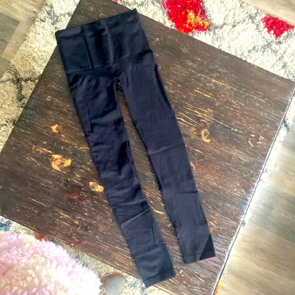 S/M high waisted SPANX tights- never used. Nylon spandex blend